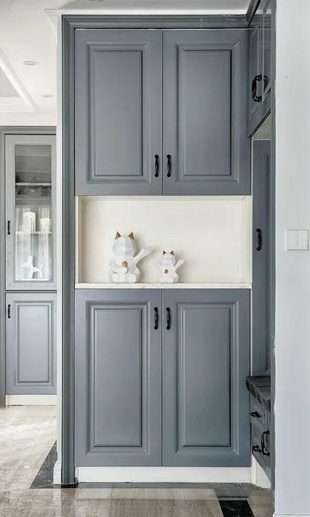 Cabinets in New Rochelle, custom kitchen cabinets in New Rochelle home, custom kitchen cabinets in New Rochelle home, built-in wall units for NYC apartment, New Rochelle cabinet installer measuring space, cherry wood custom closet cabinets installation, high-end custom cabinetry with shaker doors